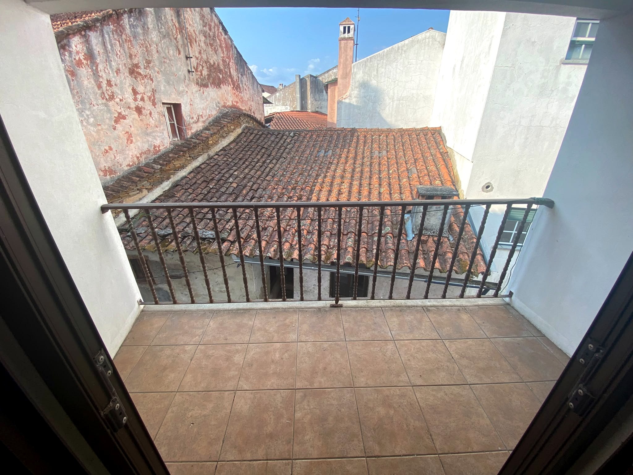 Terrace overlooking village rooftops