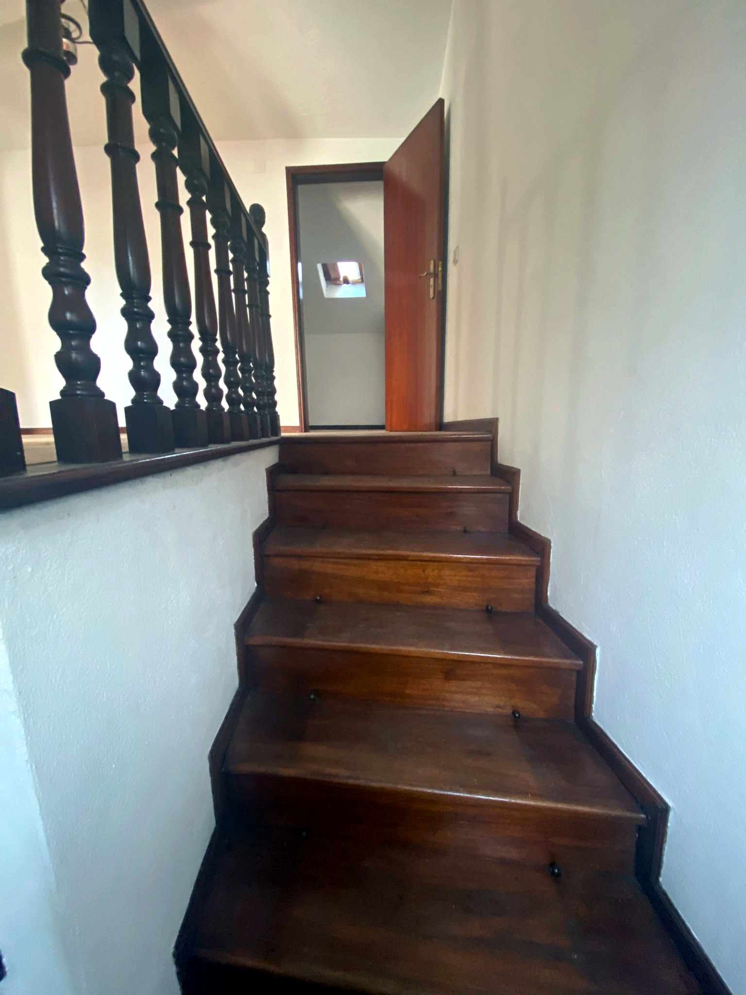 Wooden staircase and traditional tiles
